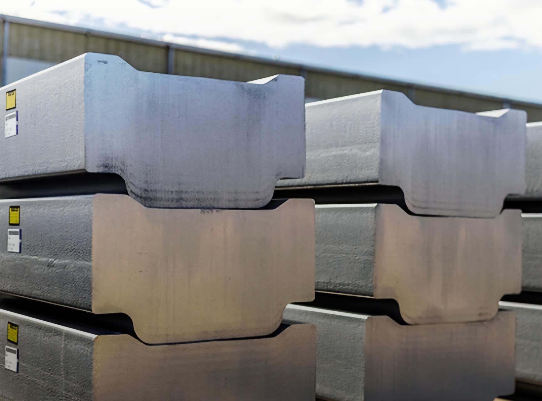 Machined aluminum blocks stacked in rows
